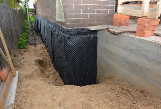 Happy homeowners after waterproofing job in Green Lake